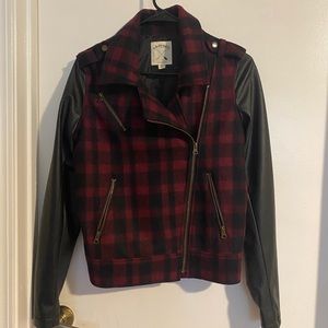 Faux leather jacket with plaid sleeves
